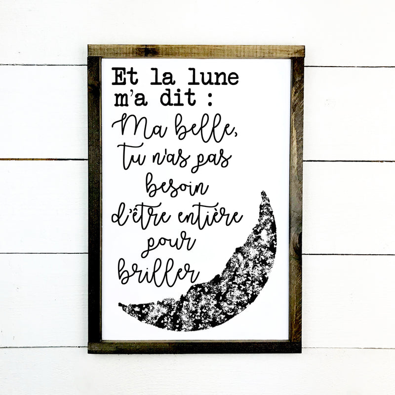 Wooden sign with frame | And the moon told me